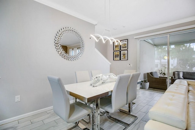 dining room with crown molding