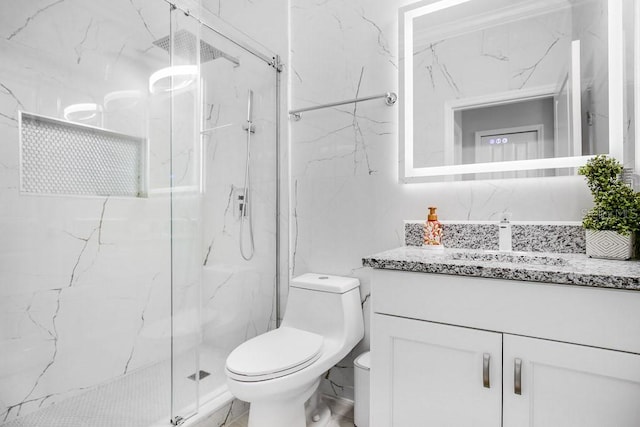 bathroom featuring vanity, toilet, and walk in shower