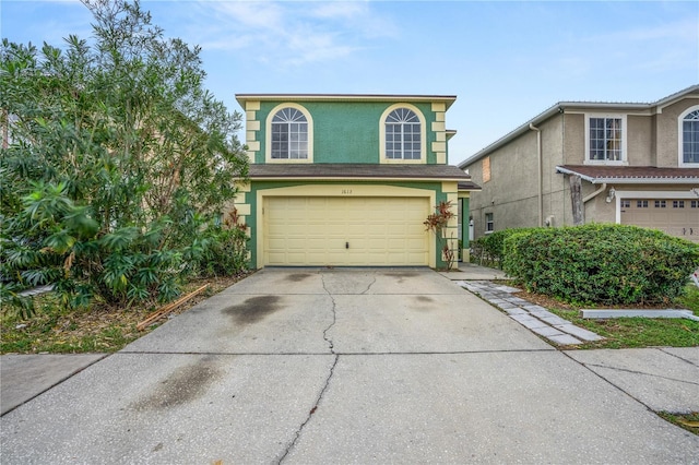 front facade with a garage