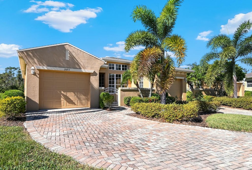 view of front of home with a garage