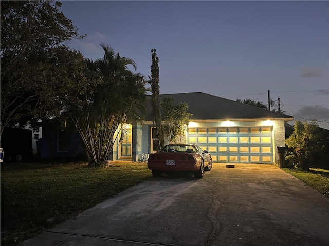 view of front of property with a garage