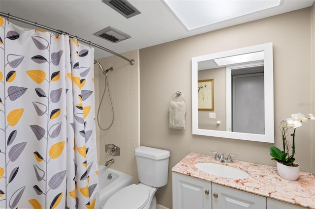 full bathroom featuring vanity, toilet, and shower / bath combo with shower curtain