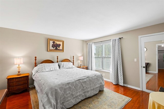 bedroom featuring dark hardwood / wood-style floors