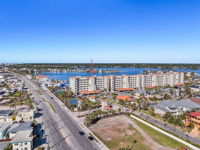 drone / aerial view with a water view