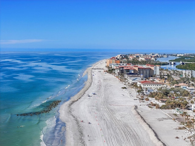 aerial view featuring a view of the beach and a water view