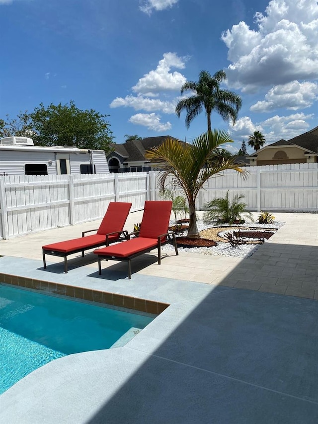 view of pool featuring a patio area