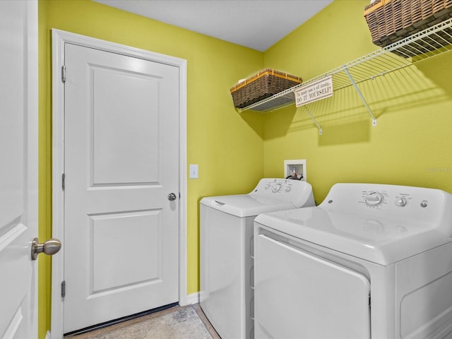 laundry room with separate washer and dryer