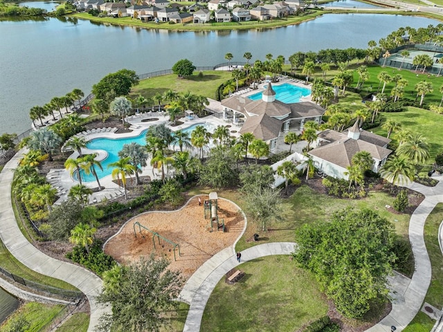 birds eye view of property featuring a water view