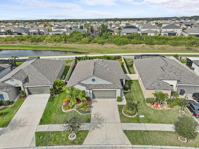 drone / aerial view featuring a water view