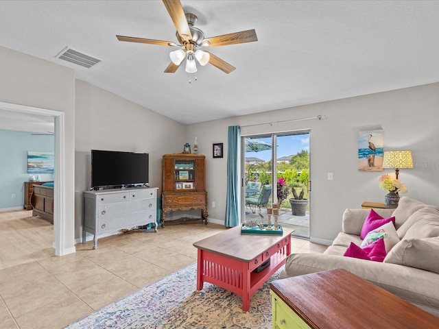 tiled living room with ceiling fan and lofted ceiling