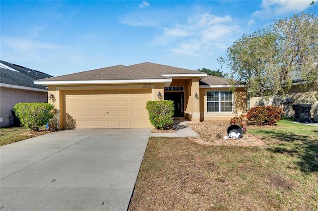 ranch-style home featuring a garage and a front lawn