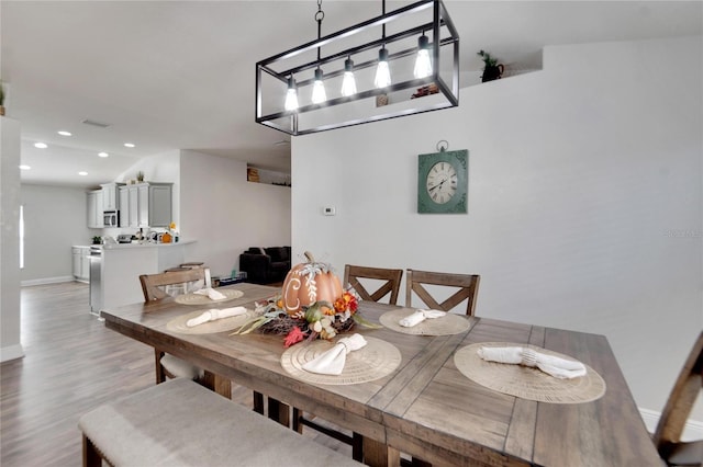 dining room featuring hardwood / wood-style flooring