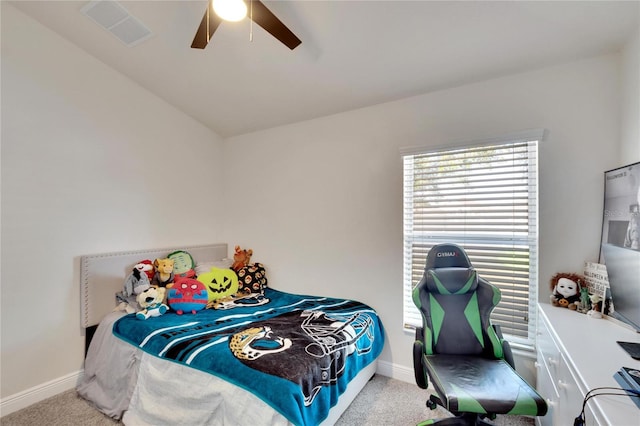 bedroom featuring light colored carpet, ceiling fan, and lofted ceiling