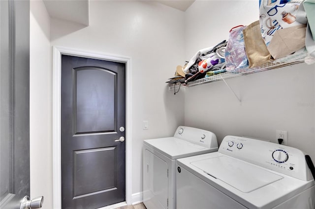 washroom with independent washer and dryer