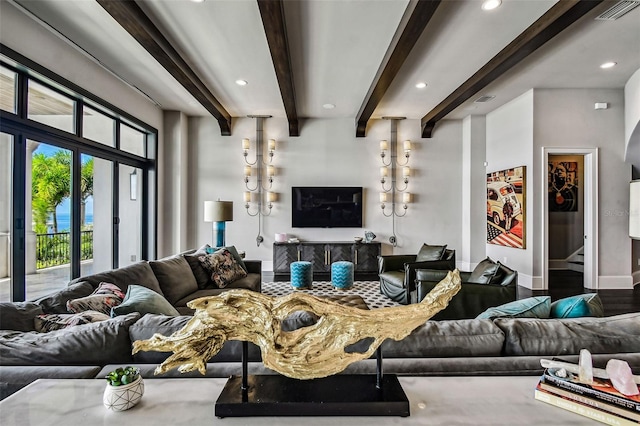 living room with beamed ceiling and wood-type flooring