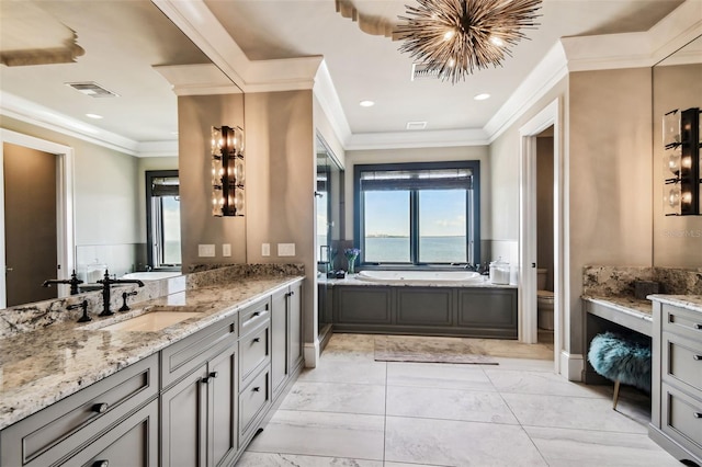 bathroom featuring an inviting chandelier, vanity, ornamental molding, and toilet