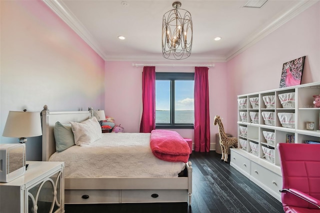 bedroom with ornamental molding, dark wood-type flooring, and an inviting chandelier