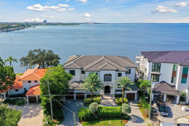 birds eye view of property featuring a water view