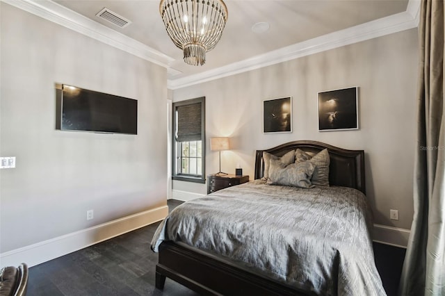 5120 W Longfellow Ave, Tampa, FL 33629 - bedroom with baseboards, a chandelier, crown molding, and dark wood-style flooring