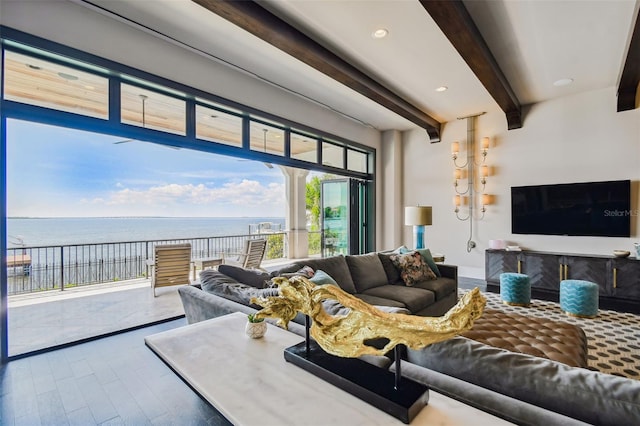 living room with beam ceiling and hardwood / wood-style flooring