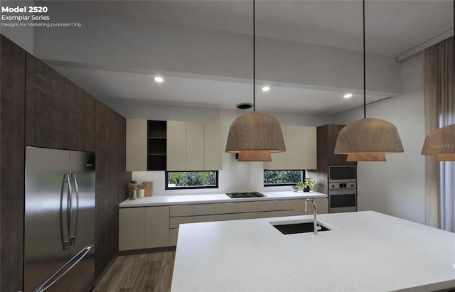 kitchen featuring decorative light fixtures, sink, a kitchen island with sink, dark wood-type flooring, and stainless steel appliances