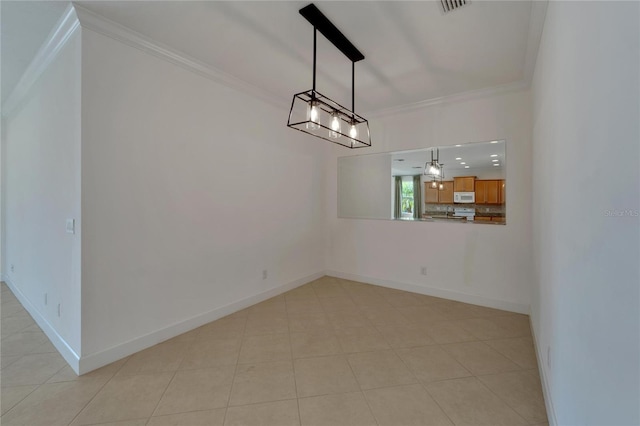 unfurnished dining area featuring light tile patterned floors and crown molding