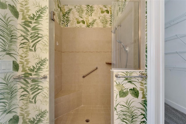 bathroom featuring tiled shower