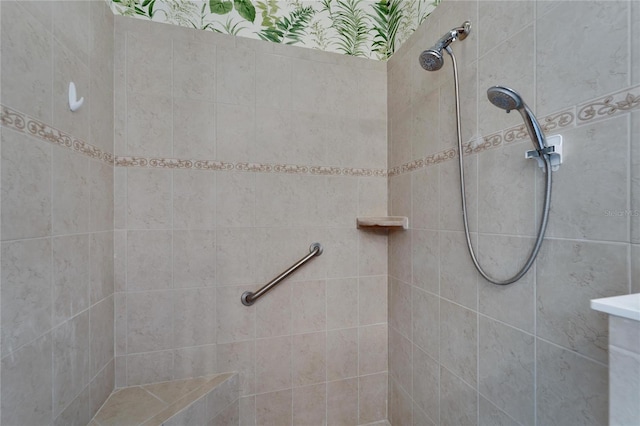 bathroom featuring tiled shower