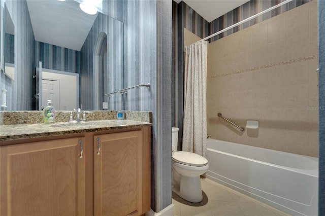 full bathroom featuring toilet, vanity, tile patterned floors, and shower / bathtub combination with curtain