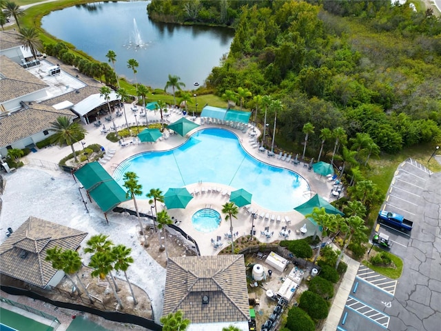 birds eye view of property featuring a water view