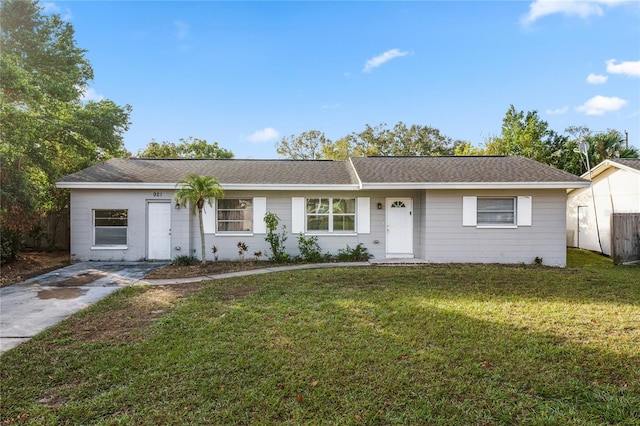 ranch-style house with a front yard