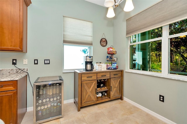 bar featuring light tile patterned flooring