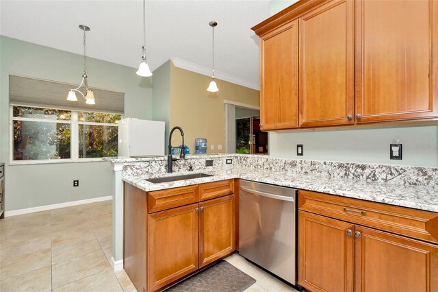 kitchen with sink, decorative light fixtures, kitchen peninsula, and dishwasher