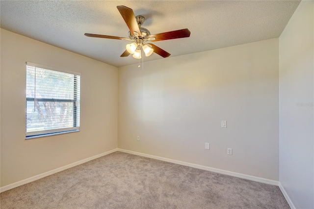 11339 Gulfstream Blvd, Port Charlotte, FL 33981 - carpeted spare room with ceiling fan and a textured ceiling