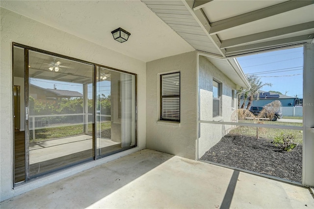 property entrance with a patio area