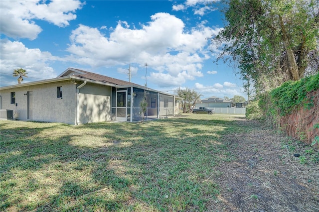11339 Gulfstream Blvd, Port Charlotte, FL 33981 - fenced yard with a sunroom