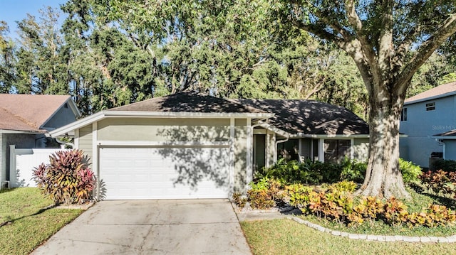 14631 Village Glen Cir, Tampa, FL 33618 - single story home with an attached garage and driveway