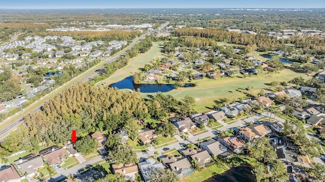 14631 Village Glen Cir, Tampa, FL 33618 - aerial view of property and surrounding area featuring nearby suburban area, a golf club, and a large body of water