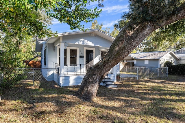 bungalow-style home featuring a porch