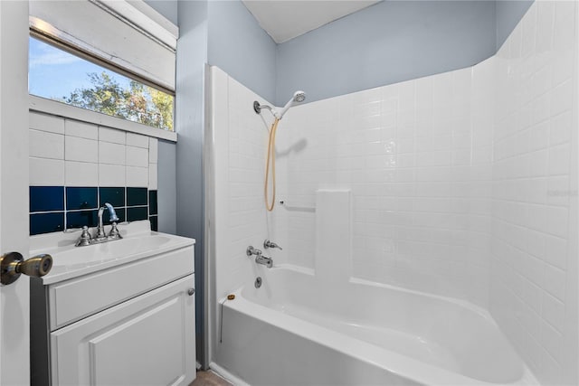 bathroom featuring vanity and bathing tub / shower combination