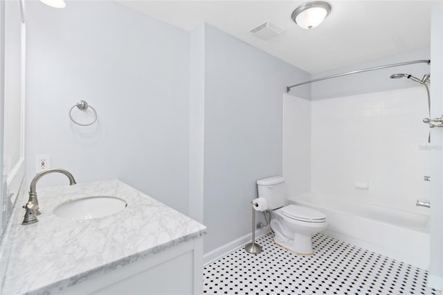 full bathroom featuring vanity, tub / shower combination, and toilet