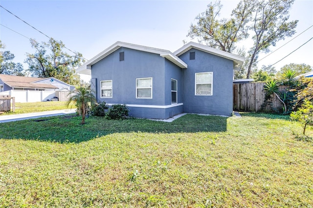 exterior space with a yard