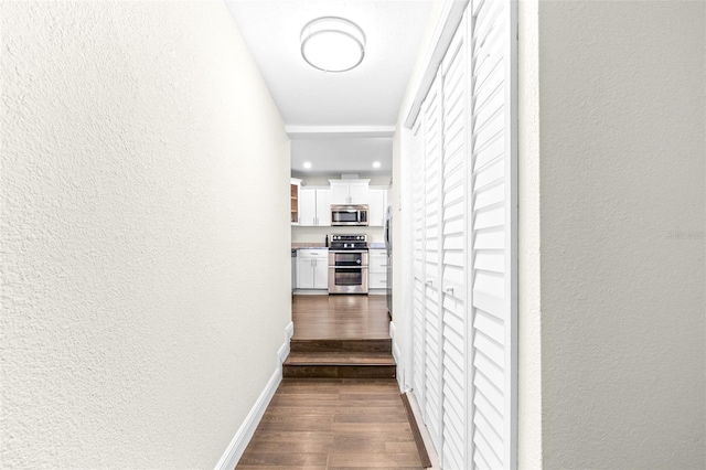 hall featuring dark hardwood / wood-style flooring