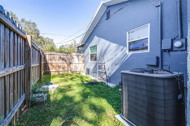 view of yard with central AC unit