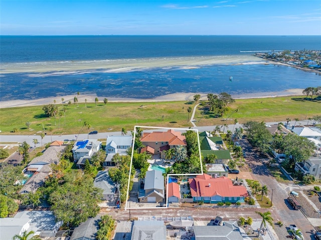 aerial view featuring a water view and a beach view