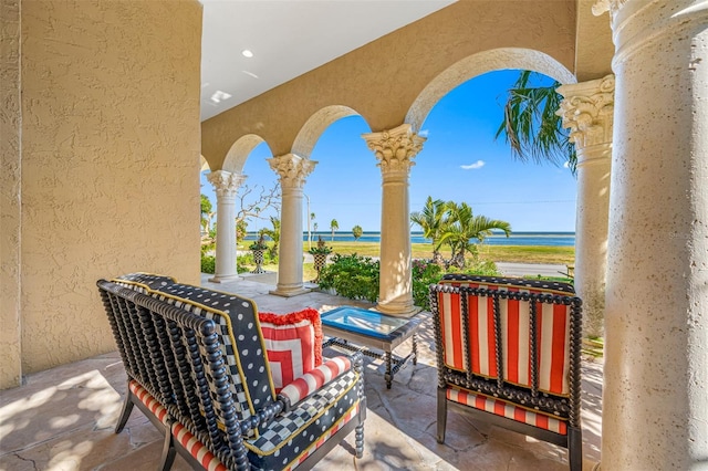 view of patio / terrace with a water view