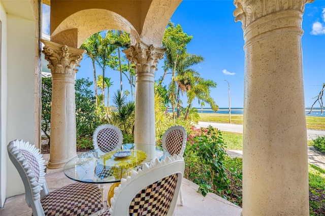 view of patio / terrace featuring a water view