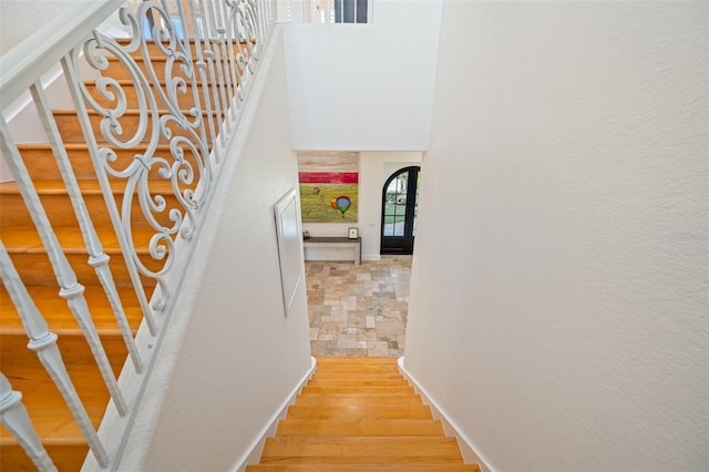 stairway with wood-type flooring