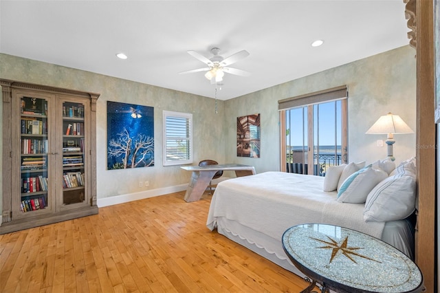 bedroom featuring light hardwood / wood-style floors and ceiling fan