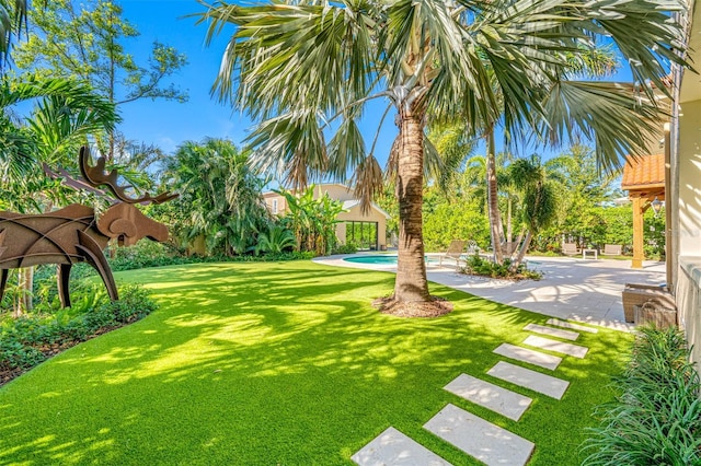 view of yard with a patio area